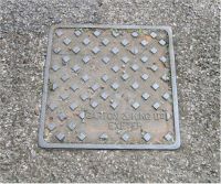 Manhole Diagonally Split Name Bottom corner