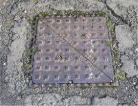 Manhole Diagonally Split Name on both Triangles in longest side EXETER Nr Cleveland St