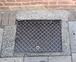 G&K Manhole in pavement