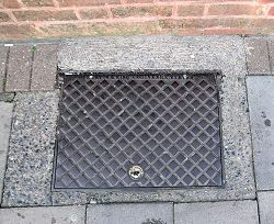 G&K Manhole in pavement